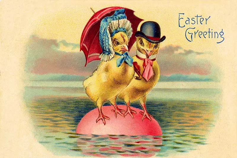 Male and female Easter chicks on floating egg