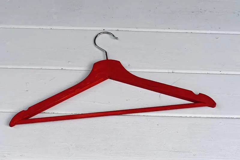red painted coat hanger