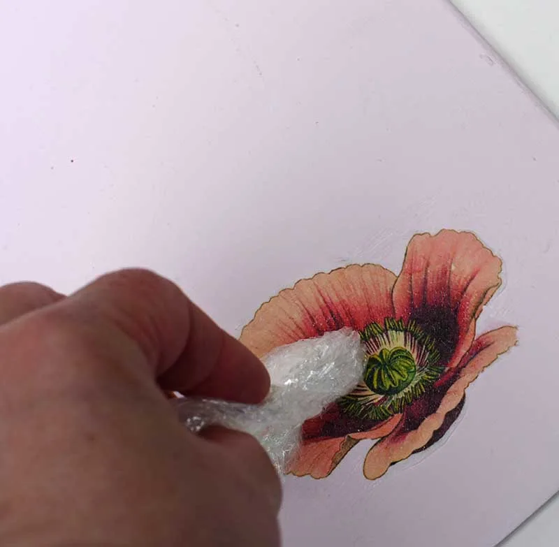 pressing image into glue 