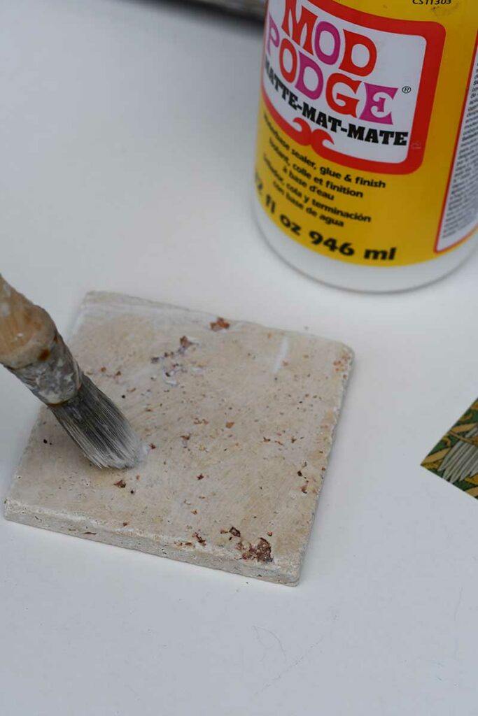 Pasting the ceramic tile with Mod Podge
