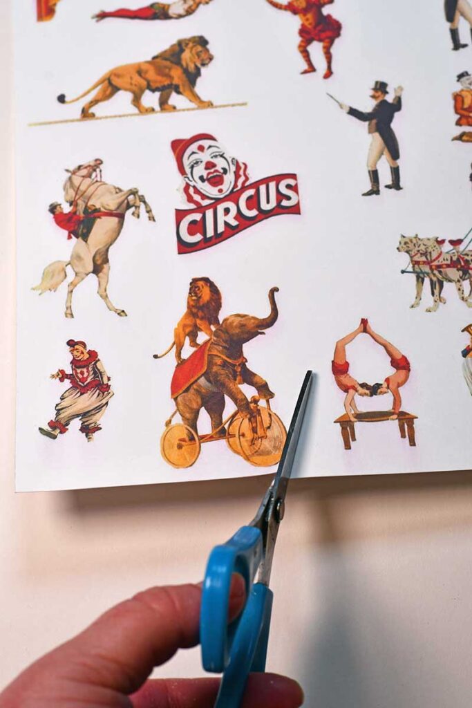 Cutting out the circus performers.