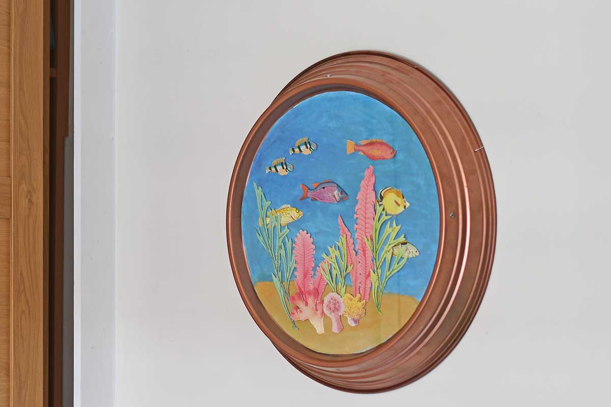 under the sea porthole collage from wall clock