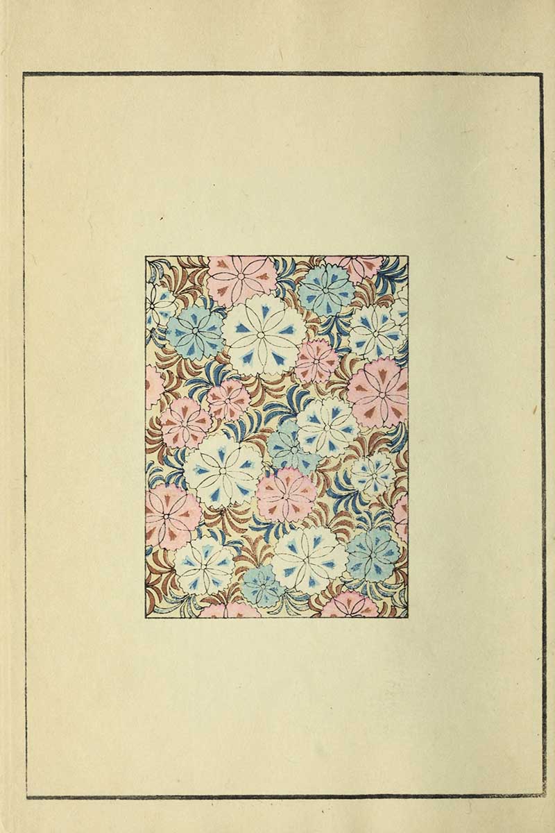Pink, blue, and white chrysanthemum blossoms with swirling brown and navy foliage on a dense floral textile, vintage Nippon collection