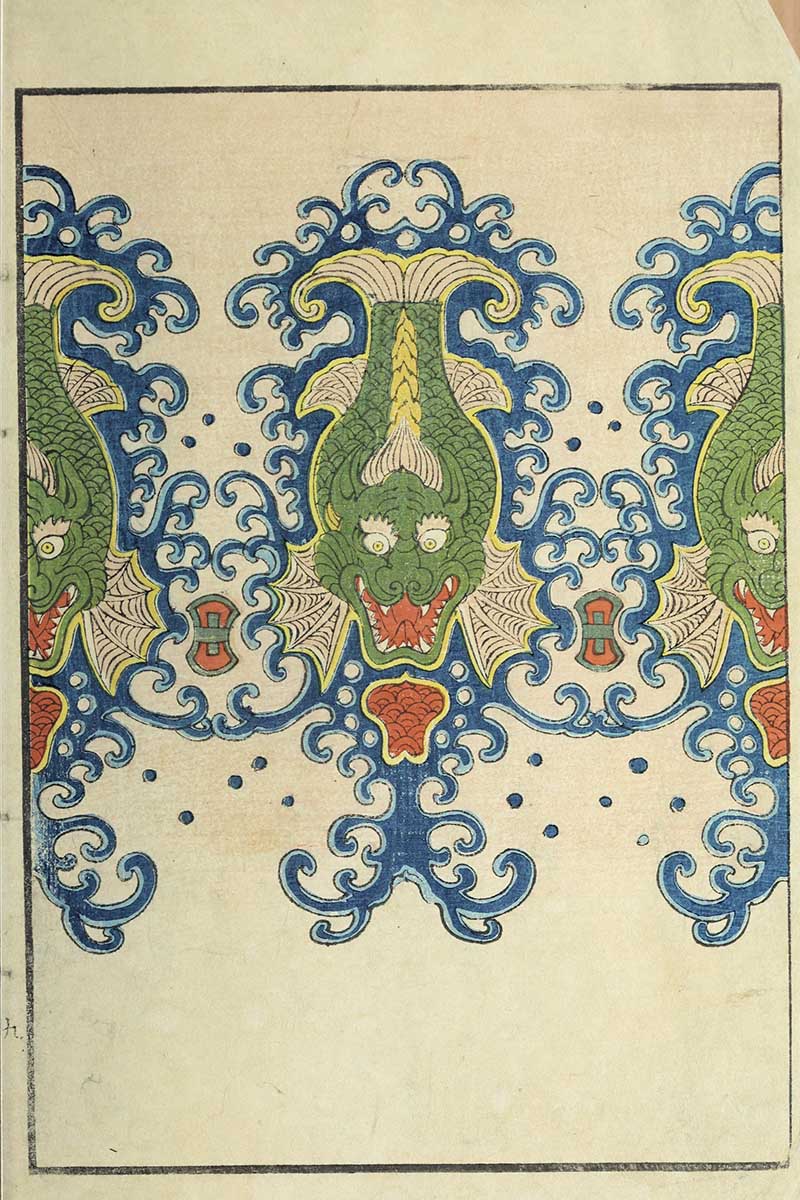Japanese textile pattern with central green dragon head flanked by smaller dragons surrounded by blue scrolling clouds and wave motifs vintage Nippon collection