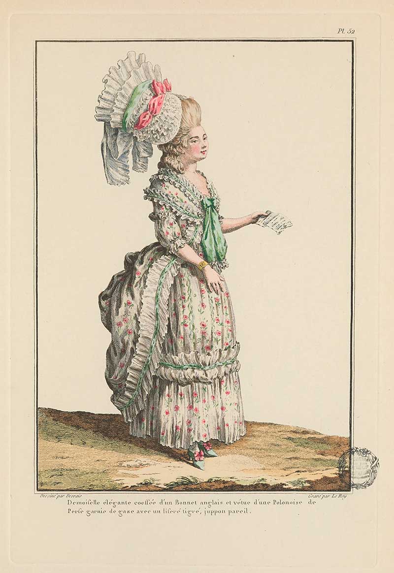 Woman in a pale floral gown with green sash, tall lace headdress, and letter in hand standing outdoors, French Galerie des Modes fashion print 18th century costume illustration