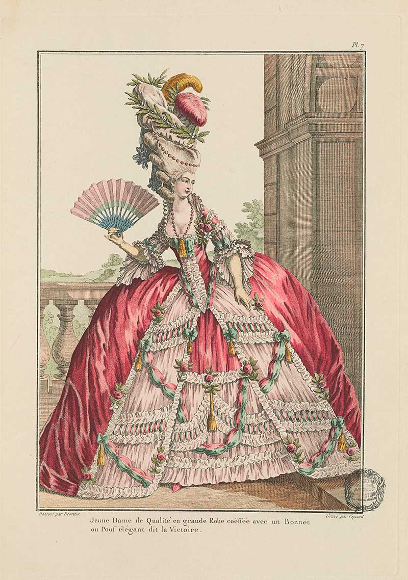 Elegant woman in a full pink gown with white ruffles, green garlands, feathered hat, and fan by a stone column, French Galerie des Modes fashion print 18th century costume illustration