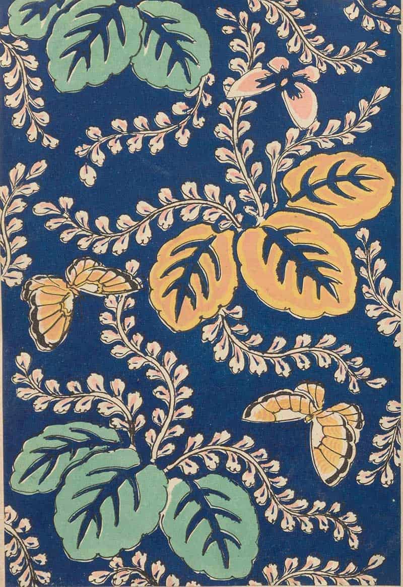 Yellow butterflies and leafy white vines on a deep blue background in a vintage decorative butterfly pattern