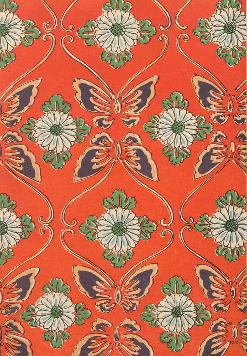 Red patterned background with repeated stylised butterflies and white flowers in a vintage decorative textile design