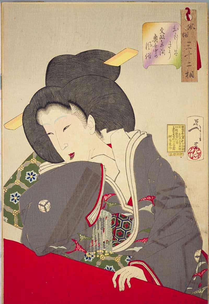 Tsukioka Yoshitoshi, Thirty-two Aspects of Customs and Manners: Amused: Habits of a high-ranking lady-in-waiting of the Bunsei era, showing woman in grey and floral robes looking down over a bright red railing.