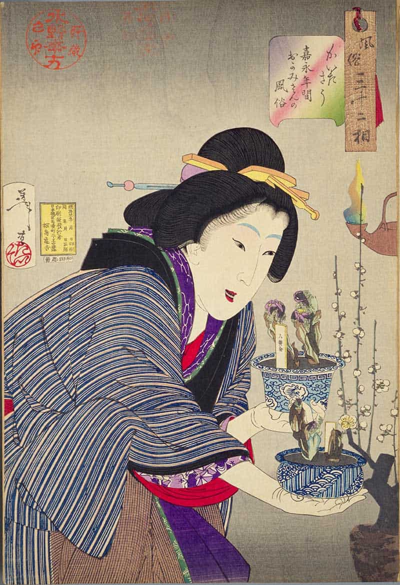 Tsukioka Yoshitoshi, Thirty-two Aspects of Customs and Manners: Undecided: Habits of a proprietress of the Kaei era, showing woman arranging miniature figures and branches on a decorated vase or stand.
