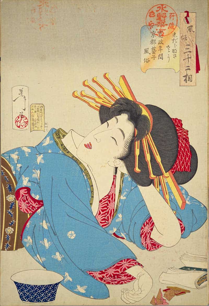 Tsukioka Yoshitoshi, Thirty-two Aspects of Customs and Manners: Loose: Habits of a geisha of Kyoto of the Kansei era, showing relaxed woman in a blue kimono leaning on one hand beside a cup and small objects.