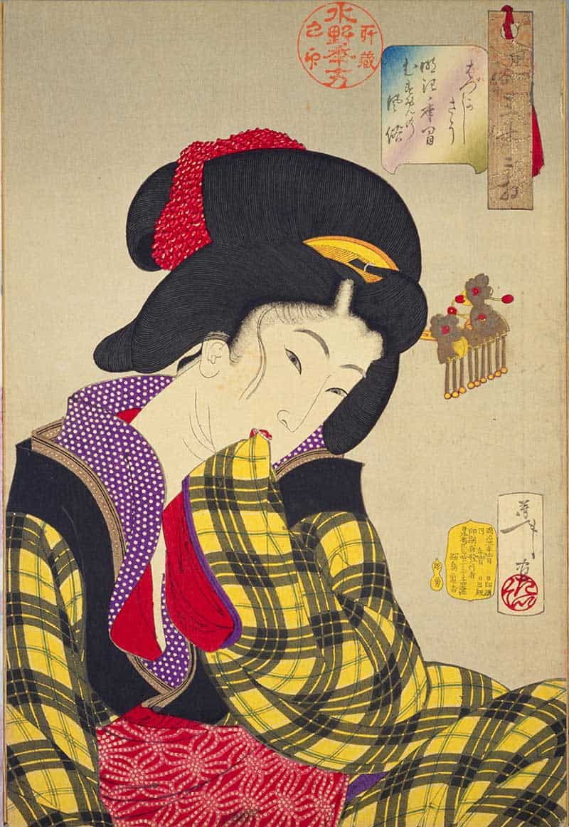 Tsukioka Yoshitoshi, Thirty-two Aspects of Customs and Manners: Embarrassed/Shy: Habits of a young woman of the Meiji era, showing shy young woman in a yellow plaid kimono looking sideways with a hair ornament behind her.