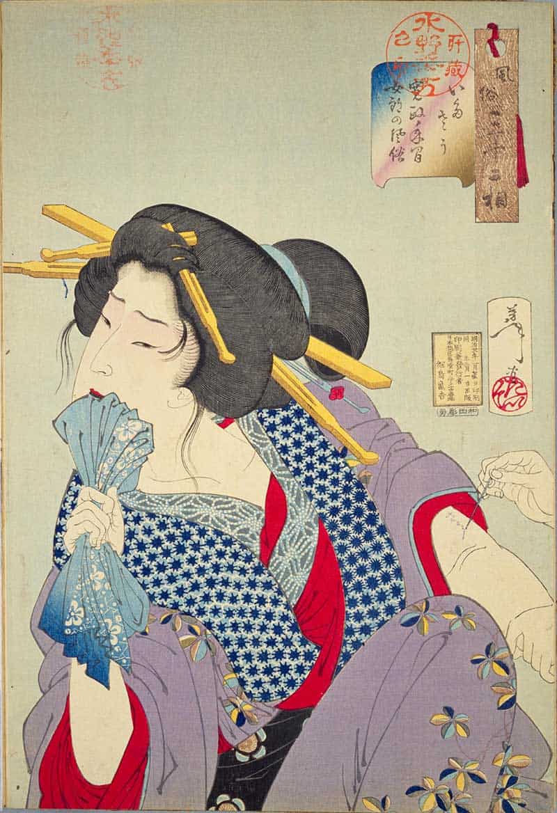 Tsukioka Yoshitoshi, Thirty-two Aspects of Customs and Manners: Painful: Habits of a prostitute of the Kansei era, showing woman in patterned robes biting cloth while another hand tattoos or treats her arm.