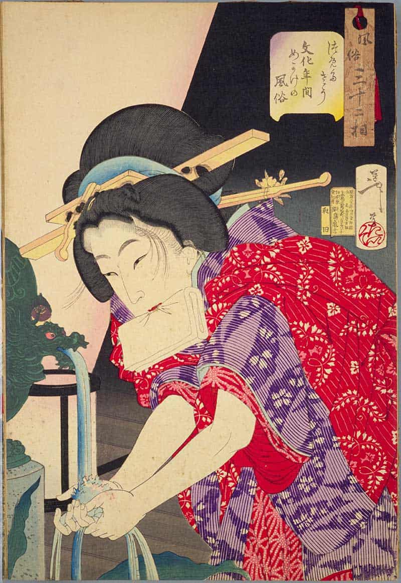 Tsukioka Yoshitoshi, Thirty-two Aspects of Customs and Manners: Chilly: Habits of a concubine of the Bunka era, showing woman in red and purple robes washing or drawing water by an indoor basin.